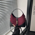 Contrast suede dumpling bag in burgundy and black with gold hardware lock - Burgundy