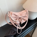 Pink bow shoulder bag with pearl chain strap and textured fabric for women - Pink