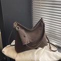 Dark brown faux leather tote bag with white stitching and envelope charm detail - Brown