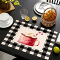 Linen Christmas placemat with red mug design and black and white checkered border - Red Mug Smiley Face Style (13)