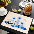 Linen placemat with Day of the Dead skull print on a dining table with bread basket - Style-6 (Skull Blue Candles)