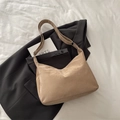 Khaki suede hobo shoulder bag with adjustable strap displayed on a black blazer - No Pendant / Khaki