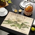 Détail du set de table en lin avec motifs botaniques de magnolia et texte vintage - Modèle 2 / 45*30cm