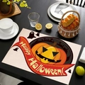 Close-up of Halloween linen placemat featuring a pumpkin and Happy Halloween text - Graveyard Ghost Pumpkin (Style-6)