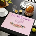 Close-up of pink linen placemat with Mother's Day floral pattern and mother-child illustration - Mother and Child Illustration Style (款式-5)