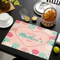 Linen placemat with Happy Mother's Day text and pink carnations on a dark wood table - Carnation Floral Holiday Style (款式-7)