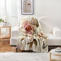 Detail of vintage floral flannel blanket featuring pink roses and butterflies on a sofa - French Country Flower Style (Style-6)