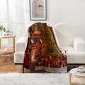 Detailed Christmas flannel blanket with trees and fireplace print on a white sofa - Style 6