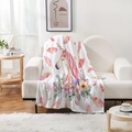 Plush unicorn pattern flannel blanket draped over a cozy white sofa in a modern room - 70x100cm / Flannel / Style-1 (00002)
