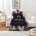 Detail of Christmas flannel blanket with golden reindeer and bells on white sofa - Style 18
