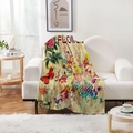 Detail of vintage floral butterfly blanket draped on a modern sofa in a warm living room - Red Rose Ink Splash Style (Style-11)