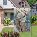 Linen garden flag with deer and Hello Winter text on a black metal holder outdoors - 45x30cm