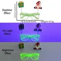 Green Christmas light-up glasses featuring Santa and gift box on spring toppers - Gift Box Rudolph