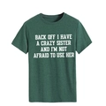 Detalle de una camiseta de algodón verde oscuro con un eslogan blanco impreso frontal - Verde Retro (Fuente Blanca)