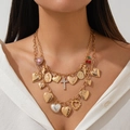 Layered gold heart pendant necklace with pearls, cross, and angel charm for women - Gold Double Layer Pearl Style (5481)