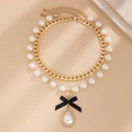 Double-layer gold Cuban link and pearl necklace with black ribbon bow and drop pendant - Gold (05479)