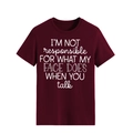 Detail of burgundy cotton T-shirt featuring white typographic I'm Not Responsible slogan - Wine Red (White Font)