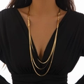 Three-layer gold herringbone snake bone necklace with braided detail on elegant model - Gold Braided Snake Style (6532)