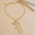 Goldene Gliederkette mit Augen- und Herzanhängern und funkelnden Kristallakzenten - Gold (06534)