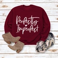 Flat lay of wine red Perfectly Imperfect sweatshirt with brown boots and plaid scarf - M / Wine Red Sweatshirt (White Font)