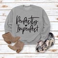 Flat lay of gray Perfectly Imperfect sweatshirt with brown boots and plaid scarf - M / Grey Sweatshirt (Black Font)
