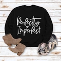 Flat lay of black long sleeve sweatshirt with white Perfectly Imperfect letter print - M / Black Sweatshirt (White Font)