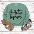 Detail of sage green sweatshirt with Perfectly Imperfect print and ribbed cuffs - M / Light Green Sweatshirt (Black Font)