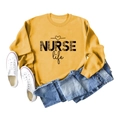 Flat lay of yellow long sleeve sweatshirt with leopard NURSE Life print and denim jeans - S / Yellow (Black Font)