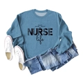 Flat lay of blue crewneck sweatshirt featuring NURSE life leopard print and heart detail - S / Blue (Black Font)