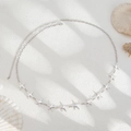 Silver waist chain with starfish pendants on a sandy beach background for women - Waist Chain (1693) / Silver