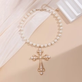 Elegant gold-tone cross pendant necklace with pearls and multi-layer choker chain - Gold