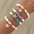Böhmisches buntes Heishi-Perlen-Armbandset mit vier Teilen und goldenen Seestern-Anhängern - Seestern Anhänger Stil