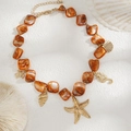 Bohemian orange shell bead necklace with gold starfish and seahorse ocean charms - Gold + Orange Sea Creature Charm Style (06675)