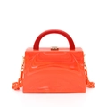 Orange marble acrylic handbag with bold red handle and resin chain crossbody strap - Orange Red