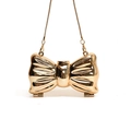 Goldene Abendtasche in Schleifenform mit Hochglanz-Spiegeleffekt und Gliederkette - Schleife Stil - Gold