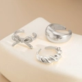 Detailsicht des silbernen Schleifenring-Sets mit Croissant- und Glanzbändern - Silber Schleife Twist Breitflächiges Offenes Ring-Set 3er-Pack (05995)