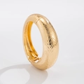 Polished gold irregular wave textured bangle with spring hinge closure - Gold