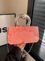Pink marble acrylic clutch bag with bold silver handle and chain strap for evening wear - Pink