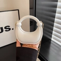 White mini crescent handbag with round handle and gold chain shoulder strap - White