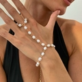 Baroque pearl hand chain bracelet with gold ring link for women on female hand - Artificial Pearl Ring-Linked Bracelet (02856) / Gold