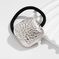 Black elastic ponytail holder with a hand-hammered silver square metal accent - Silver Hammered Square (0067)