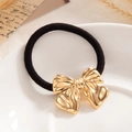 Elegant black high-elastic hair tie with polished gold metal bow charm decoration - Gold Polished Bowknot (0098)