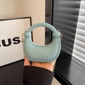 Mini light blue crescent handbag with matte silicone finish and golden chain strap - Blue