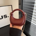 Deep burgundy mini half-moon handbag with gold chain strap and round ball handle - Burgundy