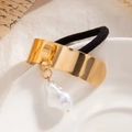 Elegant gold metal hair tie featuring a baroque pearl charm on a minimalist black elastic band - Narrow Curved Cuff Pearl Gold (0094)