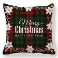 Macro shot of red and green plaid Christmas pillow cover with Merry Christmas text - Red Green Plaid Merry Christmas Holly