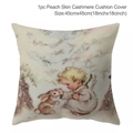 Close-up of peach skin Christmas cushion cover showing soft texture and 45x45cm size - Style-33 (Child and Rabbit in Snow)