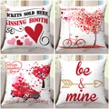 Detail showing four Valentine's Day pillow covers with red heart and bicycle prints - Gold Red Festive Style (7)