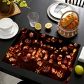 Linen placemat with Halloween pumpkin lantern print on a black textured table - Patterned Engraved Pumpkin Style (5) / 30x45
