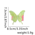 Pince à cheveux papillon paillettes vertes, dimensions 8,5x7,3cm et poids de 5,9g - Style Papillon